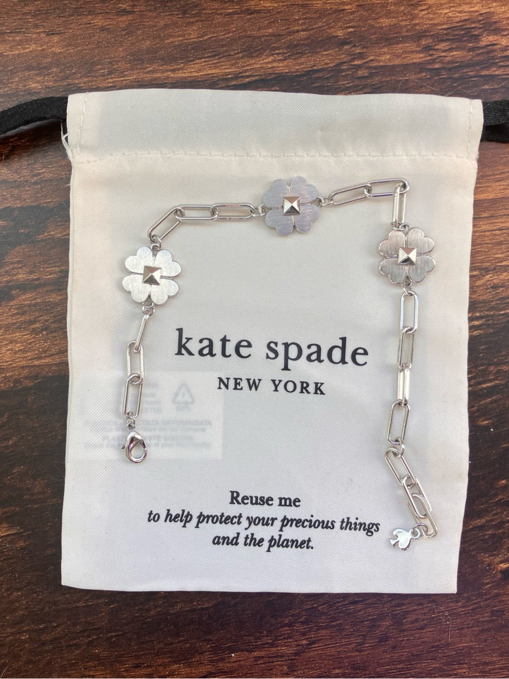 kate spade silver link bracelet with clover charms